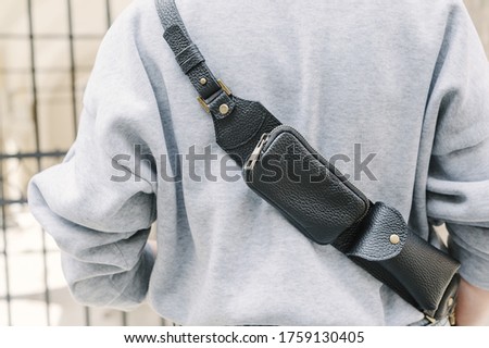Leather Utility Belt Pouch, Burning Man Utility Belt, Cell Phone Crossbody Purse. Close-up. Selective focus. Royalty-Free Stock Photo #1759130405