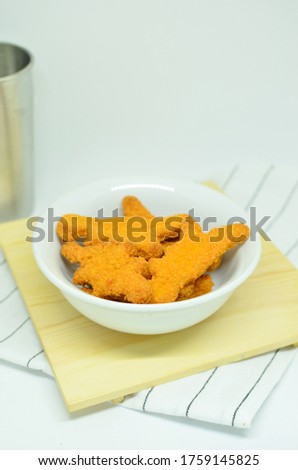 Chicken nuggets, studio shot with a white background
