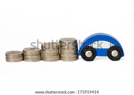 pile of coins and house detail image