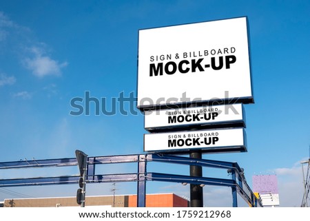 Mock up blank outdoors large billboard on top and horizontal signboard with clipping path on large pole, Empty space for insert advertising graphic design or text information, company name or banner