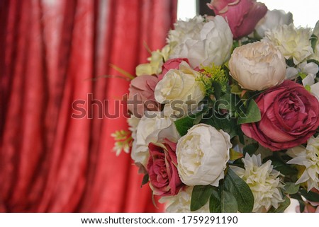 Wedding details with beautiful different colors of flowers
