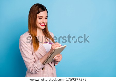 Photo of positive focused girl secretary write start-up college presentation copybook enjoy remote quarantine work wear good look classy clothes isolated over blue color background Royalty-Free Stock Photo #1759299275