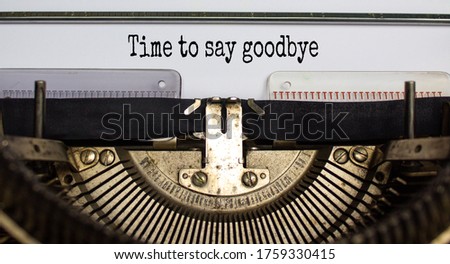 Text 'time to say goodbye' typed on retro typewriter. Business concept. Beautiful background.