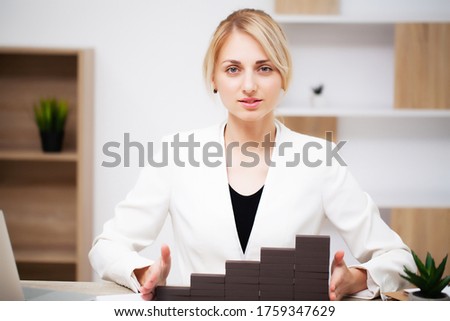 Business growth concept, beautiful young woman businesswoman builds company development plans