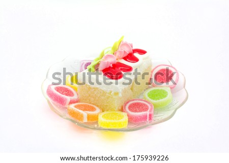 cake and sweet jelly on white background