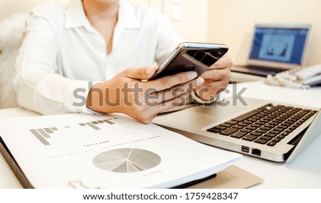 Digital marketing media in virtual screen.businesswoman hand working with mobile phone and modern compute with VR icon diagram at office in morning light