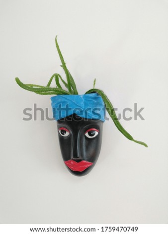 Flower planter human head with plant