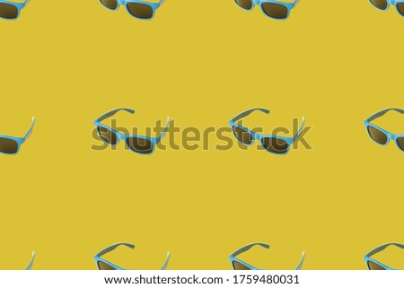 Pattern with summer blue sunglasses on a yellow background with black lenses. Summer minimalism