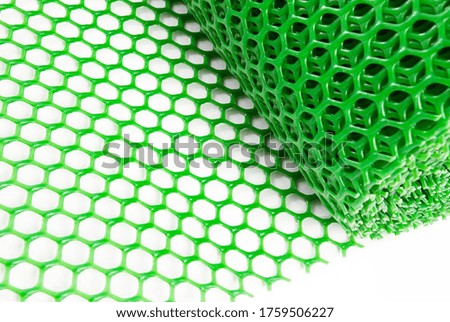 Green Plastic Granting with White Background, Irregular Grid