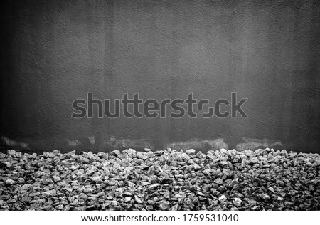 Red wall with stones, textured background detail