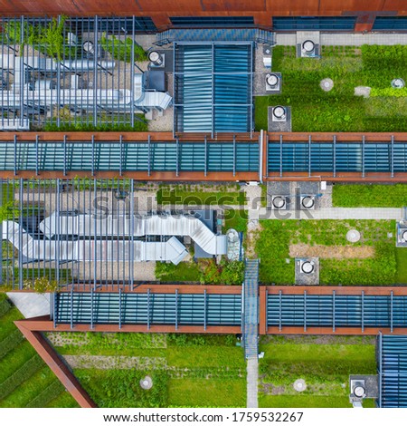 Air Condition Ventilation System Green Grass Ecology. Building Roof. Industrial Air system of ventilation and Air conditioning. Aerial Shot.