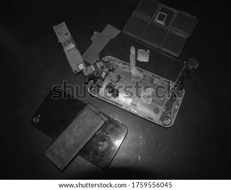 
This picture shows the inside of a broken phone.
