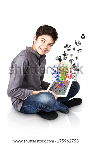  Happy boy with tablet in hand Royalty-Free Stock Photo #175962755