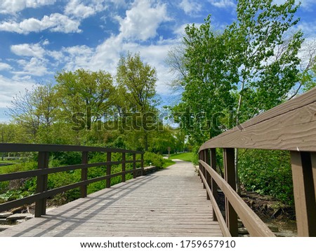 View of Central Park bridge and pathway in Oak brook, IL. USA, May 23, 2020 during health concerns for Covid-19.