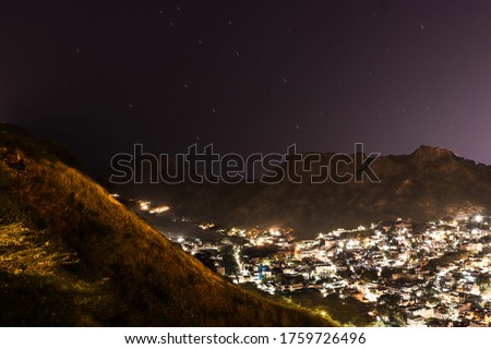 clear astro landscape with city and mountain ,shot in ajmer 