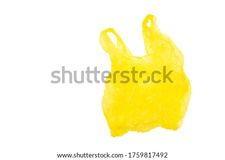 Clear disposable plastic bag on color background. Space for text