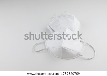 KN95 or N95 mask for protection pm 2.5 and coronavirus (COVID-19). Anti pollution mask on white background.