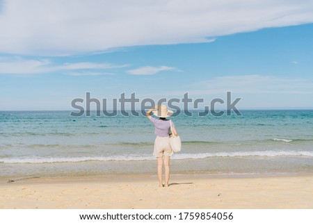 A picture of Asian woman  travel to Ky Co beach, Quy Nhon City, Binh Dinh province, Vietnam