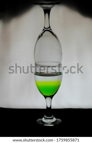 a glass of green melon juice