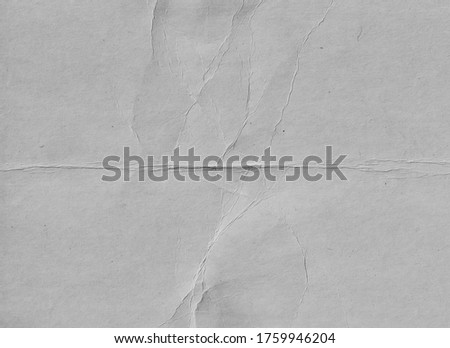 Old grey paper texture. Fold surface. Grunge background