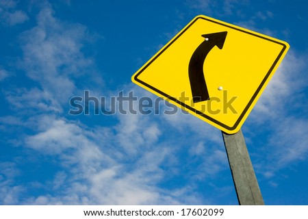 road sign against a blue sky with clipping path.