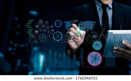 Double exposure of businessman working on digital smart phone with digital marketing virtual chart, Abstract icon, Business strategy concept. Background toned image blurred.