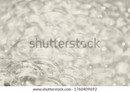 White and Silver tone bubble and blurred background