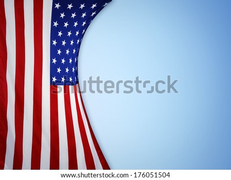 Closeup of American flag on blue background