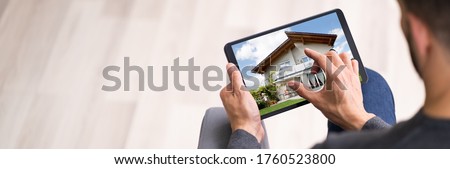 Online House And Real Estate Property Search On Tablet