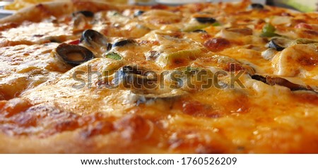 delicious cheesy and crispy pizza
