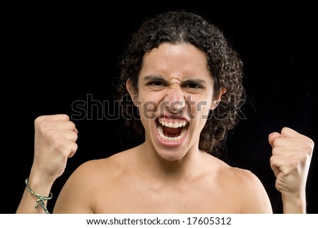 A teeneger with euphoria shouting in front a black background