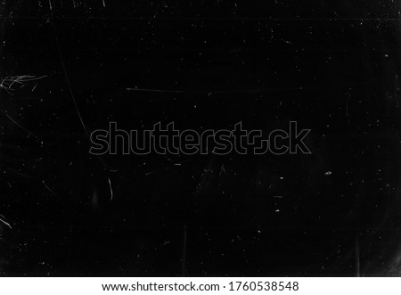 Dust scratches overlay. Old film texture. Black aged screen with white dirt effect for photo editor. Royalty-Free Stock Photo #1760538548