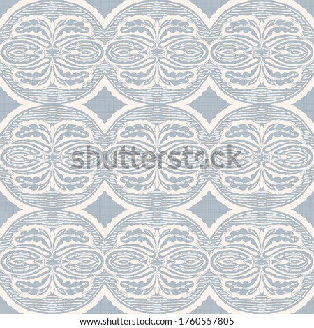  Seamless pattern in french blue linen shabby chic style. Hand drawn floral damask texture. Old white blue background. Farmhouse style wallpaper home decor swatch. Flower motif all over print