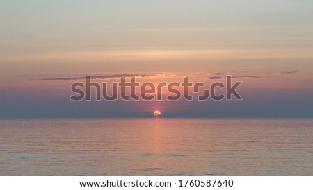 Dawn over the sea on a summer morning.