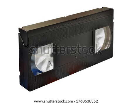 Old blank vhs analog video cassette tape isolated on white background