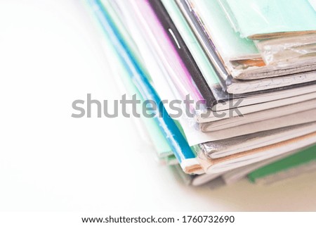 Education, a stack of notebooks on white background, copy space