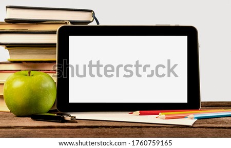 distance learning. books, map-case and apple on the table