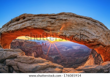 Sunrise at Mesa Arch in Canyonlands National Park near Moab, Utah, USA  Royalty-Free Stock Photo #176085914