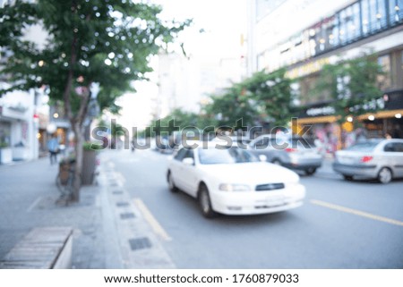 Blurred background of car on the road in the city, urban scene, Korea, Asia