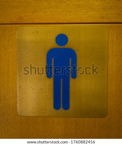 picture of the man at the toilet door. male toilet instructions