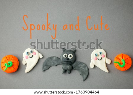 Spooky and Cute Funny toy pumpkins, ghost, bat from plasticine molded children. Scary Halloween background. Banner. Creative DIY idea for kids, daycare, kindergarten art