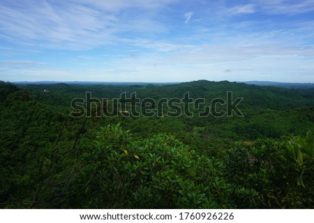 Rainforests and Hills as far as you can see. Picture taken from the highest Point of Tenggarong, East Borneo.