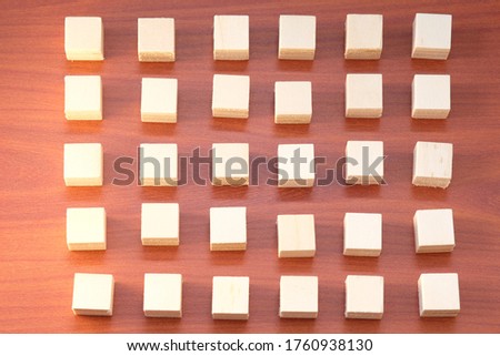 Wooden cube for business icon and wood cube pattern background, business idea concept