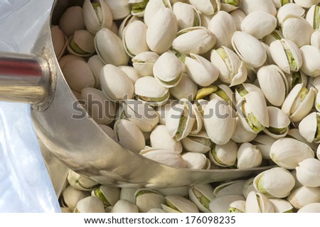 Supermarket shelves of pistachio nuts