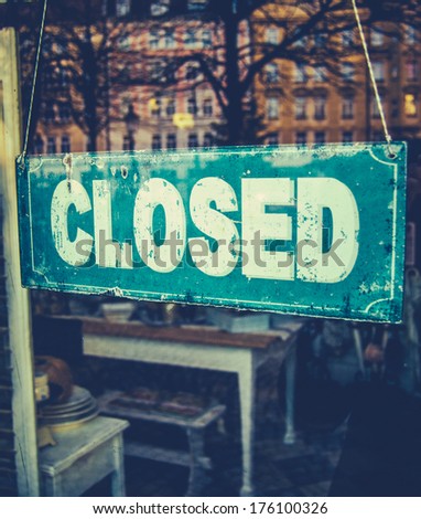 Retail Image Of Grungy Vintage Closed Sign In Furniture Boutique Store