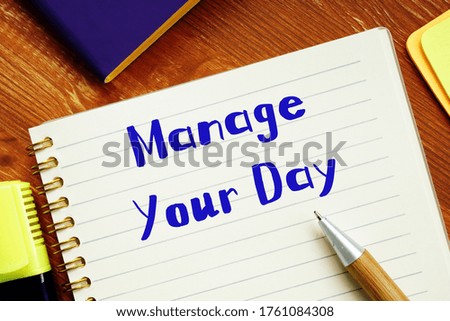 Motivation concept meaning Manage Your Day with phrase on the piece of paper.