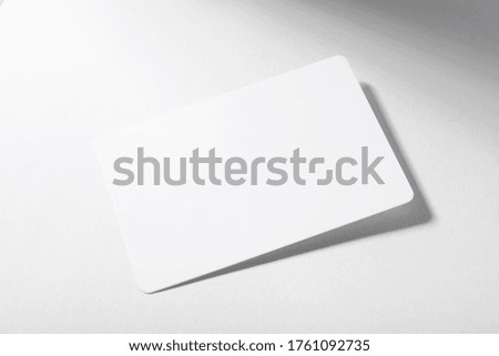 Photo of mockup business card on white background. Template for branding identity and company name.