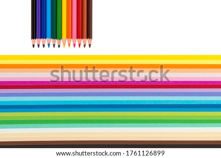 set of colored cardboard and pencils on a white background, collection