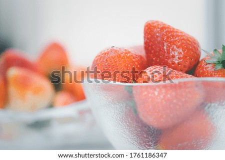Strawberry is red fresh berry fruit color and sweet juicy for sale at Thai street food and fruit market in concept food and fruit, healthy eating in life