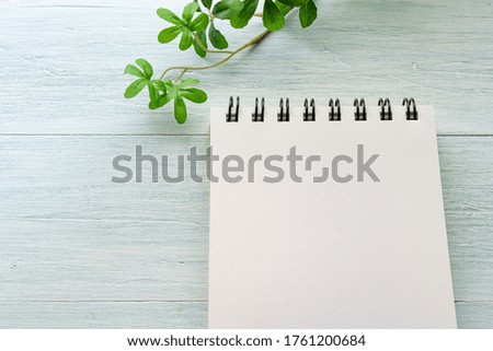 Notebook (Memo pad) on wooden background